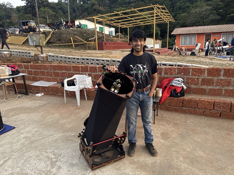 Photo of Akarsh with his 12-inch travel dob at the lodge during the March 2026 star party