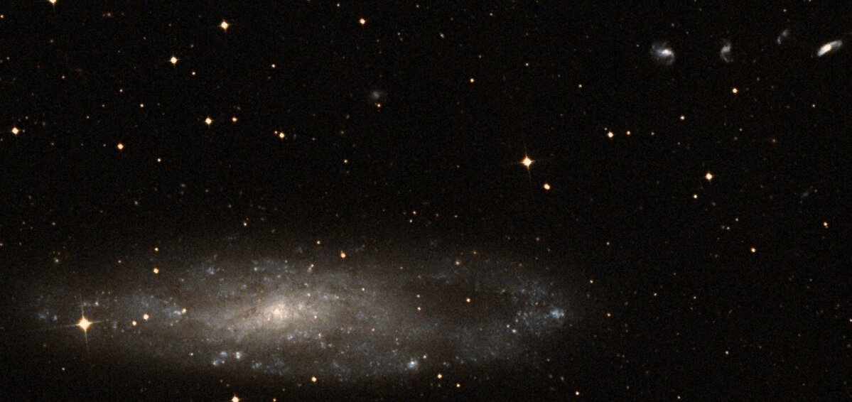 DSS2 Color image showing NGC 247 and Burbidge Chain on the top right